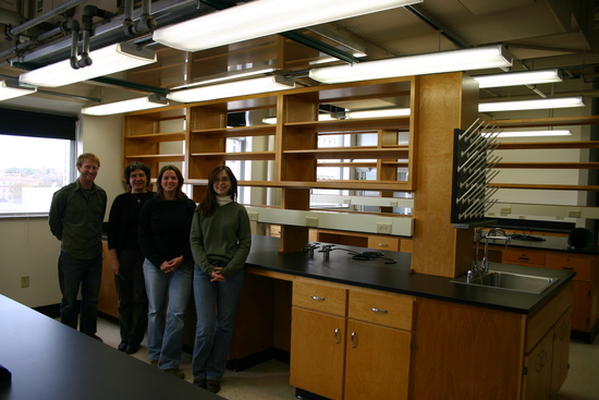A group photo of lab members from 2006 in a newly remodeled lab